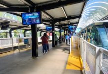 A First Look at Seattle Center Monorail Station’s Planned Access Upgrades A small crowd waits for the doors to open on a monorail train at Seattle Center