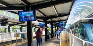 A First Look at Seattle Center Monorail Station’s Planned Access Upgrades A small crowd waits for the doors to open on a monorail train at Seattle Center