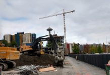 Op-Ed: Cities Must Embrace Housing Abundance to Resist Rise of Authoritarianism Construction cranes build more housing near Seattle's Space Needle.