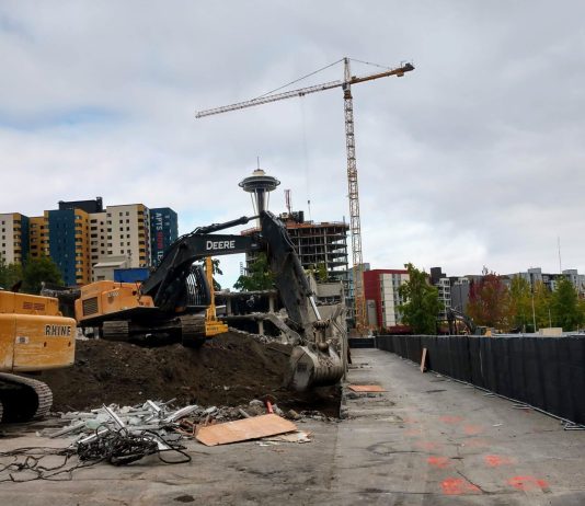 Op-Ed: Seattle’s Path to Fund Inclusionary Zoning and Boost Homebuilding Construction cranes build more housing near Seattle's Space Needle.