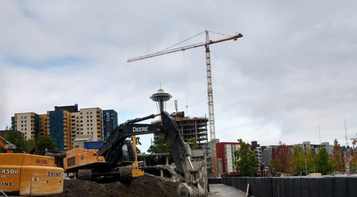 Op-Ed: Seattle’s Path to Fund Inclusionary Zoning and Boost Homebuilding Construction cranes build more housing near Seattle's Space Needle.