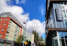 Washington Legislature Sets it Sights on Transit-Oriented Development…Again Two apartment buildings seen on a beautiful day, with one having a label of "Verve", in Redmond's Overlake neighborhood.