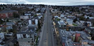 A Seattle neighborhood with apartment buildings fronting Aurora Ave N, a busy loud street
