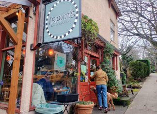 Neighborhood Cafe and Corner Store Bill Fails for Third Straight Year A patron grips the front door at Irwin's neighborhood cafe in leafy Wallingford. Customers fill the window seats inside.