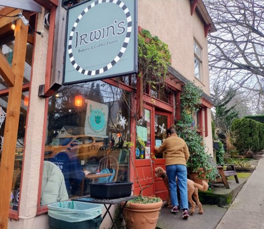 Neighborhood Cafe and Corner Store Bill Fails for Third Straight Year A patron grips the front door at Irwin's neighborhood cafe in leafy Wallingford. Customers fill the window seats inside.