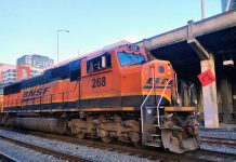 Op-ed: Boosting Freight Rail Is a Forgotten but Essential Climate Action A BNSF train comes through King Street Station