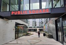 Seattle Awards $22 Million in Equitable Development Grants Aimed to Combating Displacement An alley leads into the interior public square of the Midtown Square complex.