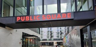 Seattle Awards $22 Million in Equitable Development Grants Aimed to Combating Displacement An alley leads into the interior public square of the Midtown Square complex.