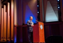 Op-Ed: Bruce Harrell Is a Failed Mayor on Public Safety Harrell grips a lectern and wears a somber look during his speech at Benaroya Hall.
