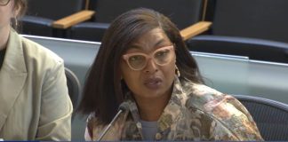 Seattle Gears Up to Fight Back as Trump Eviscerates Funding, Rights Jaelynn has long hair and yellow rimed glasses