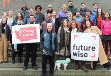 Op-Ed: Why Housing Supply Advocates Should Support Rent Stabilization  A group of about about 30 advocates stands on the Capitol steps.