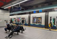 More 1 Line Disruptions Ahead for Sound Transit Riders Through May Some passengers catch a northbound train at U District Station while other wait on seats for the southbound.