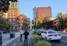 Seattle’s Scooter and Bikeshare Boom Reaches New Heights Two riders push off to accelerate on their Lime scooters on the Second Avenue protected bike lane in Belltown.