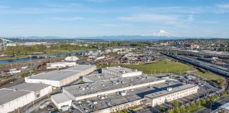 Op-Ed: Ferguson Must Get Tough on Trump, Illegal Tacoma ICE Jail The sprawling detention center is surrounded by parking with Mount Rainier in the background.