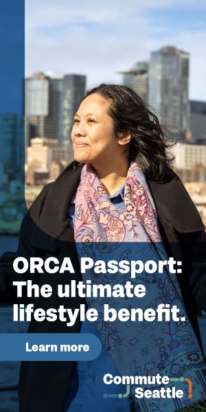 A woman smiles in front of the downtown skyline with the text: Orca Passport: The ulimate lifestyle benefit. Learn more. Commute Seattle.