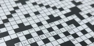 A crossword puzzle with The Urbanist written in for one of the answers.