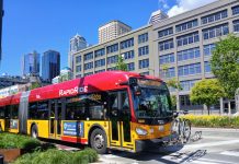 King County Floats Sales Tax Bump to Fund Metro, Roads A red RapidRide bus on the Seattle waterfront