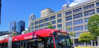 A red RapidRide bus on the Seattle waterfront