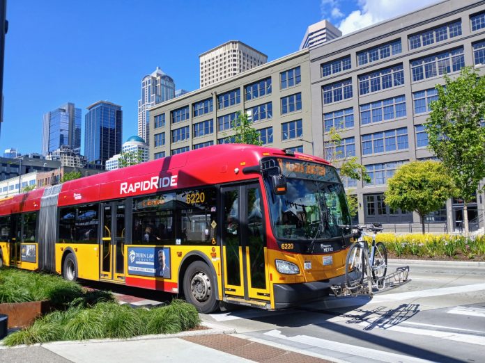 Metro bus waterfront A red RapidRide bus on the Seattle waterfront