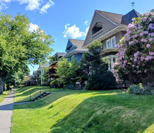 Seattle Just Rezoned Entire City — That Was the Easy Part A large home in North Capitol Hill with a sloping front lawn