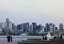 Rinck Proposes Restoring Growth Centers Dropped from One Seattle Plan A sailboat passes in front of the seating area at Gas Works with the skyline in the distance