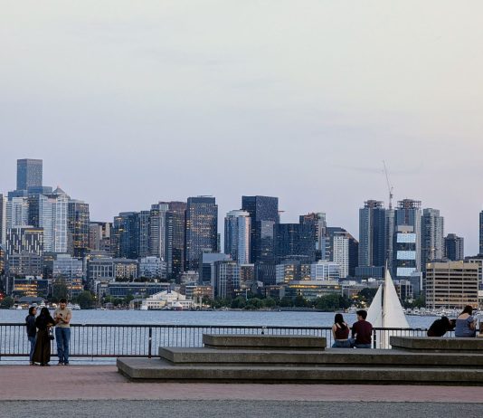 Rinck Proposes Restoring Growth Centers Dropped from One Seattle Plan A sailboat passes in front of the seating area at Gas Works with the skyline in the distance