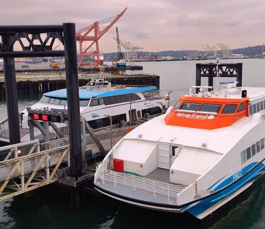 Extra Vashon Water-Taxi Trips Extended, Bremerton Fast Ferry Could Face Cuts A Kitsap Transit fast ferry sits at the dock at Pier 50 with a King County Water Taxi
