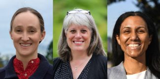 Pictured right to left, Wilson is a white woman with her hair pulled back. Balducci is a white woman with gray hair and her glasses on her head. Foster is a black woman in a gray blazer.