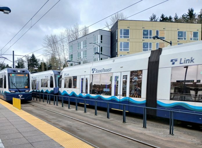 Link trains Two Link trains at an at-grade station in the Rainier Valley
