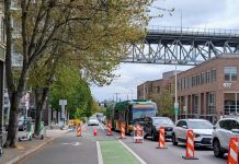 Metro Bus Reliability Dips as Summer Construction Season Hits The view east up N 34th Street with the steel-spanned Aurora Avenue bridge in the distance.