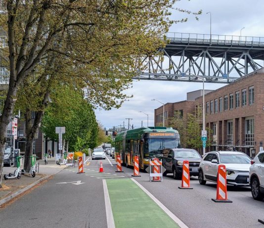 Metro Bus Reliability Dips as Summer Construction Season Hits The view east up N 34th Street with the steel-spanned Aurora Avenue bridge in the distance.