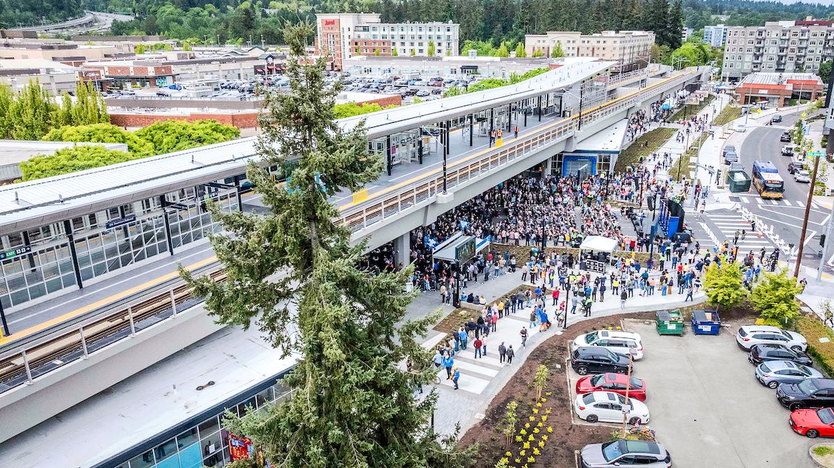 An aerial shot of the crowd at Downtown Redmond Station during opening festivities.