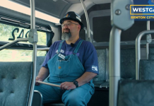 Michael Westgaard Centers Renton Council Bid on Upgrading Transit Westgaard wears denim overalls and has a goatee and glasses