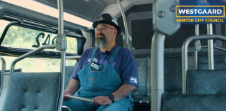 Michael Westgaard Centers Renton Council Bid on Upgrading Transit Westgaard wears denim overalls and has a goatee and glasses