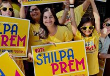 Op-Ed: Shilpa Prem Is the Best Choice for Kirkland Council Prem and young supporters pose with yellow campaign shirts and yard signs.