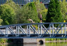 Seattle Street Ends: South Lake Union two guys jumping off the top of the ped bridge