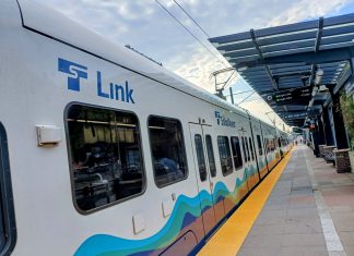 Escalating Costs Could Push Sound Transit to Reconsider Two Infill Stations A Sound Transit light rail car passes through a station in the Rainier Valley