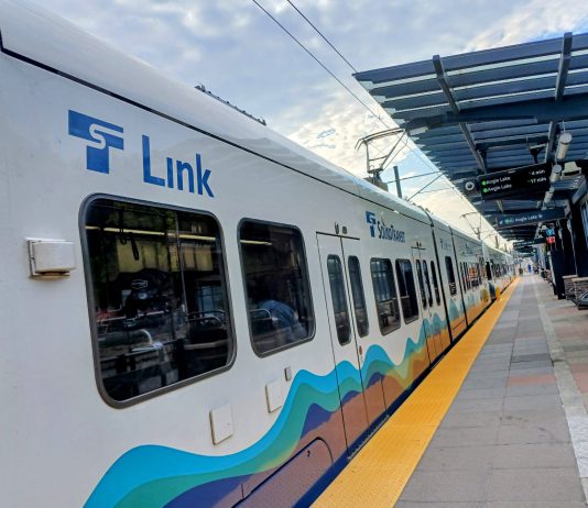 Escalating Costs Could Push Sound Transit to Reconsider Two Infill Stations A Sound Transit light rail car passes through a station in the Rainier Valley