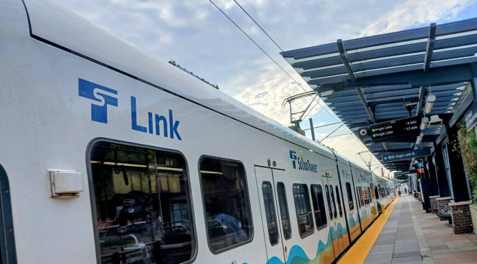 Escalating Costs Could Push Sound Transit to Reconsider Two Infill Stations A Sound Transit light rail car passes through a station in the Rainier Valley
