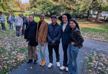 Urbanist Podcast Election Extravaganza: Puget Sound Progressives Prevail The five candidates stand shoulder to shoulder in Columbia Park, which is lined with trees in full autumn colors.