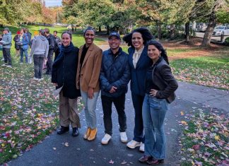 Looking Back on The Urbanist’s 2025 The five candidates stand shoulder to shoulder in Columbia Park, which is lined with trees in full autumn colors.