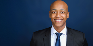 After Victory, Zahilay Announces County Executive Transition Team Girmay Zahilay, a Black millennial man wearing a suit, standing in front of a blue background