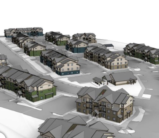 Pierce County Boosts Affordable Housing Creation, Leveraging New Maureen Howard Fund A rendering shows a cluster of lowrise apartment buildings surrounded by surface parking and access roads.