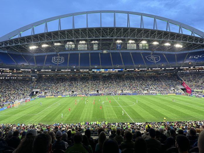 Tens of thousands of soccer fans attend a Sounders FC match at Lumen Field. (Stephen Fesler)