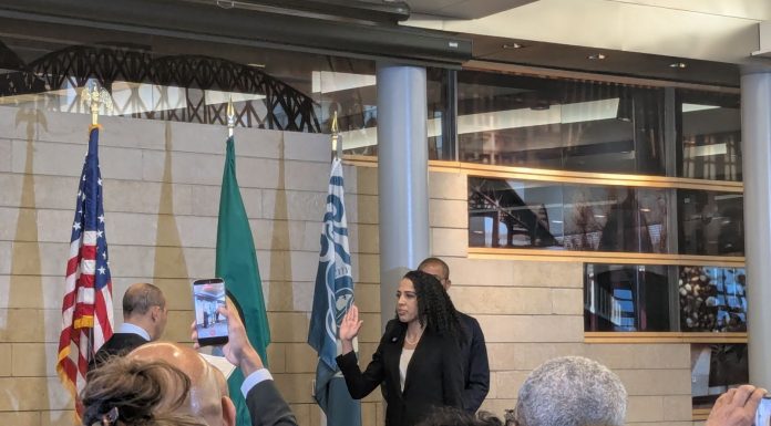 Erika Evans Take City Attorney Oath, SPOG Goes on Attack