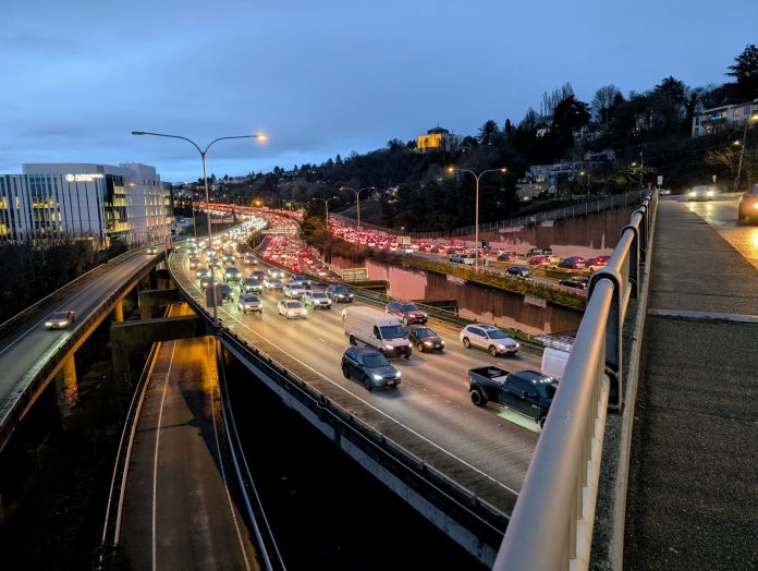 I-5 northbound brakelights during bridge work - Trumm 20260131 The I-5 view from the Lakeview Boulevard bridge looking north with bumper to bumper traffic at dusk.