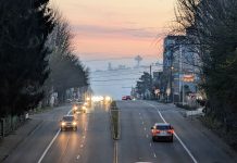 Op-Ed: Nobody Wants to Live Next to a Highway The view south toward the Space Needle from Fremont with a misty evening giving the sunset a peach tinge.