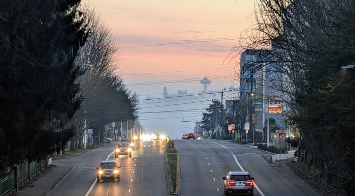 Op-Ed: Nobody Wants to Live Next to a Highway The view south toward the Space Needle from Fremont with a misty evening giving the sunset a peach tinge.